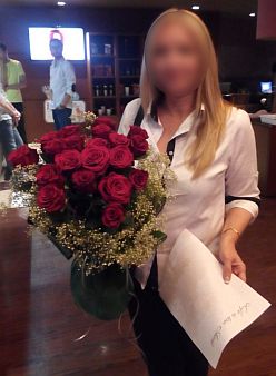 Women with 20 red roses