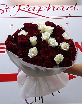 31 red and white roses to St. Raphael
